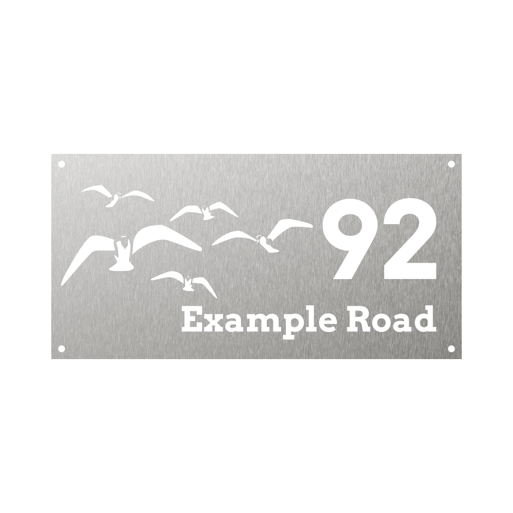 Rectangular metal steel house number with flock of seagulls flying